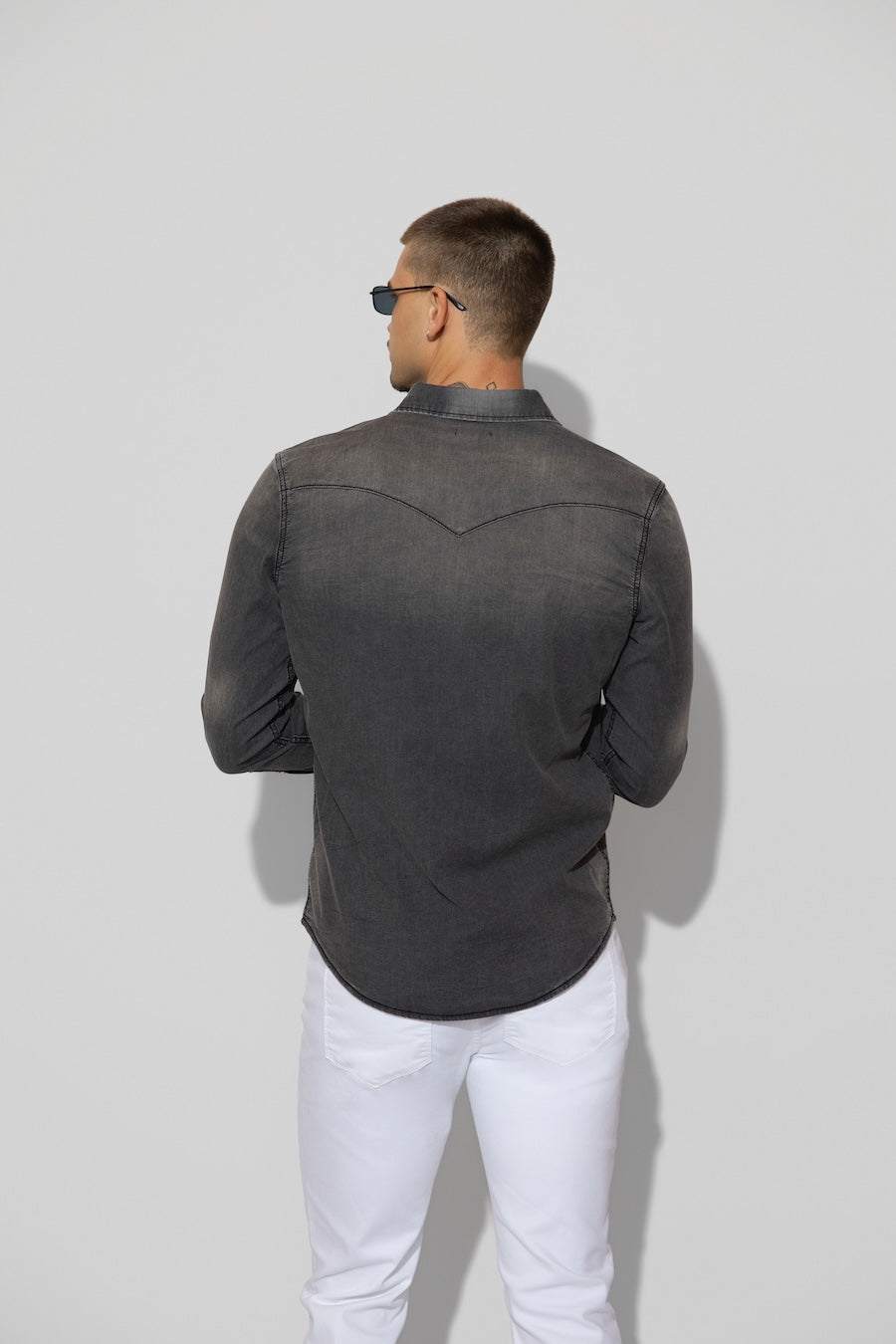 Back profile of MONFRÈRE Eastwood Smokescreen men's dark grey Japanese stretch denim western shirt.