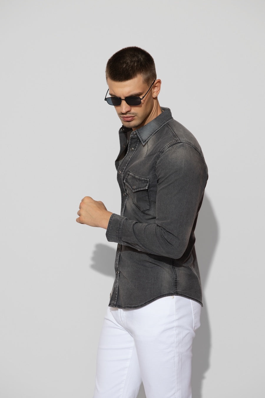 Side profile of MONFRÈRE Eastwood Smokescreen men's dark grey Japanese stretch denim western shirt.