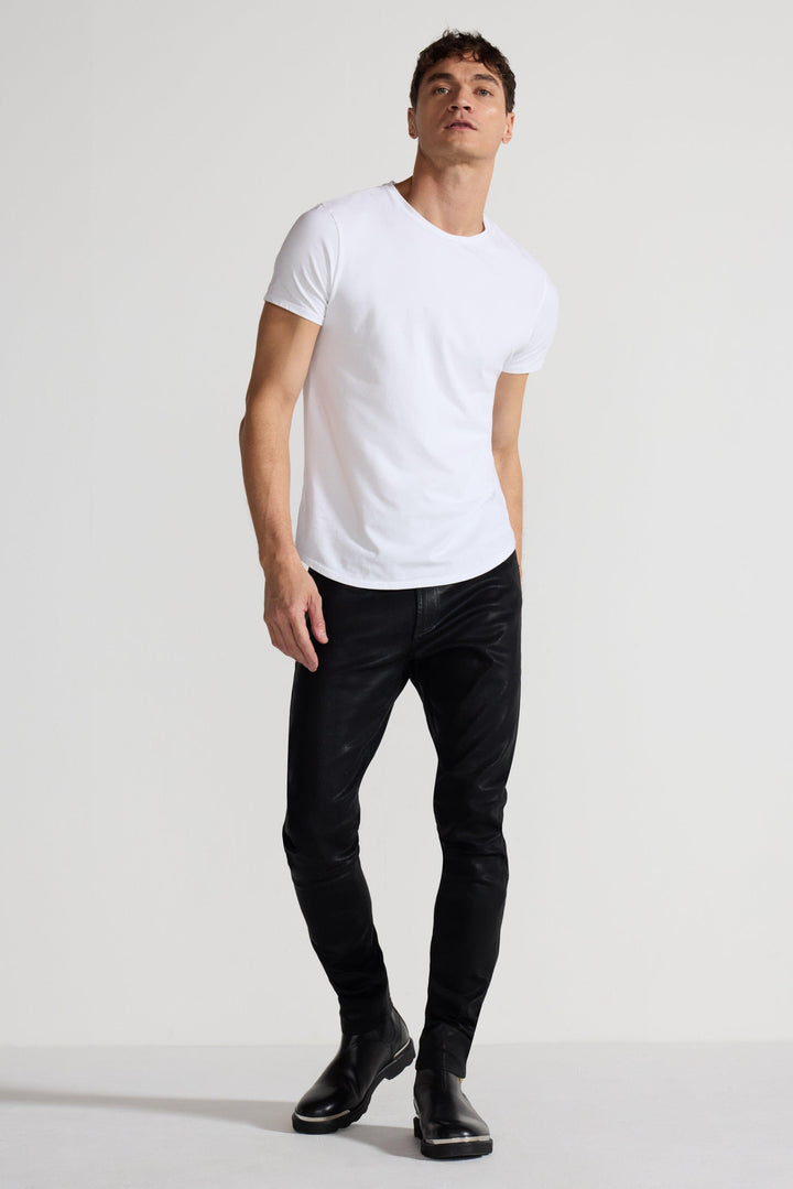 Model wearing MONFRÈRE Greyson Coated Noir men&