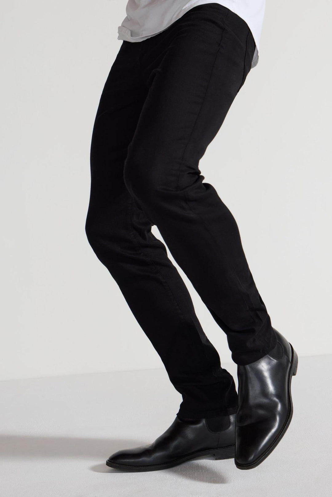 Detail view of MONFRÈRE Greyson Noir men's black Japanese stretch denim five pocket skinny jean.