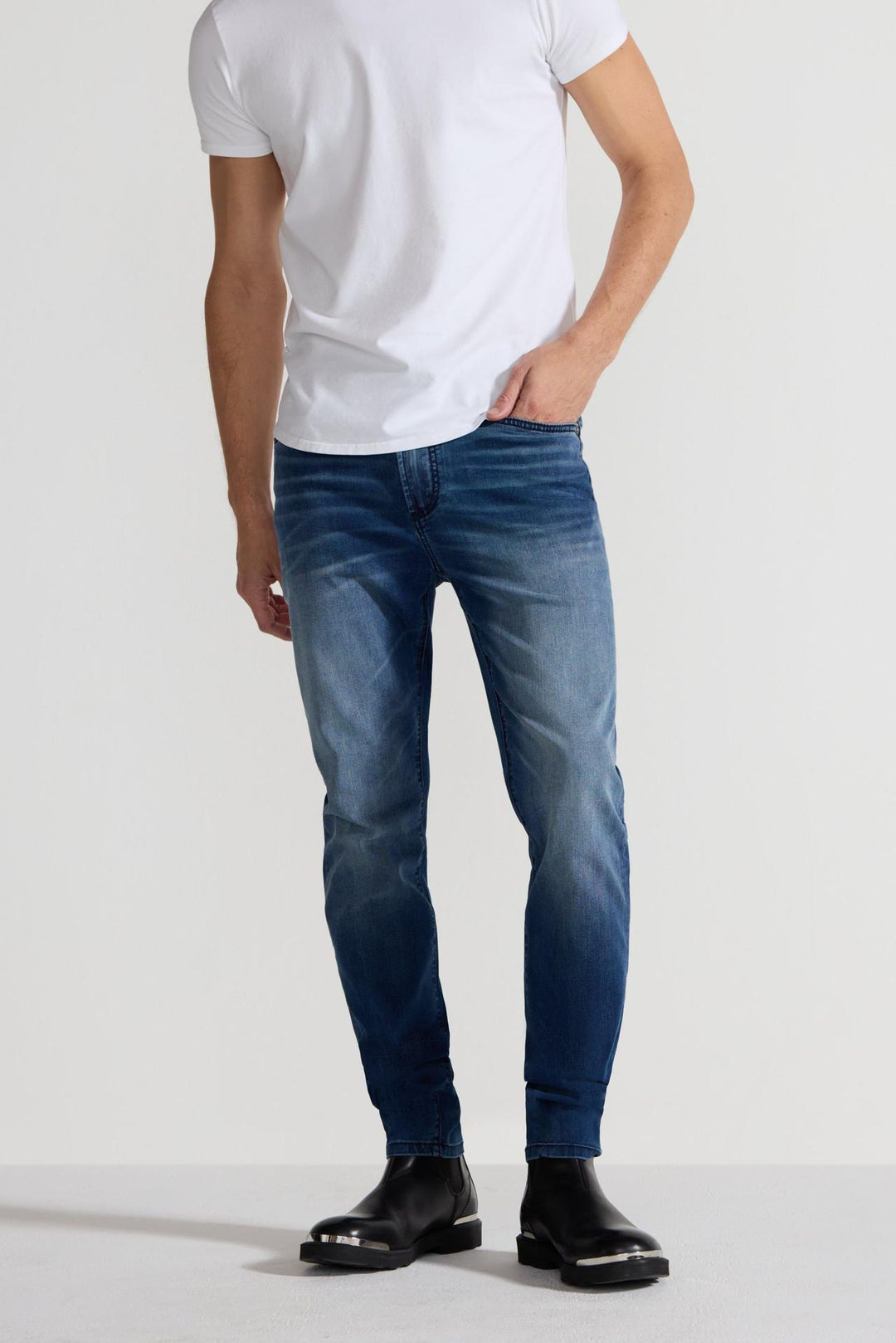 Front profile of MONFRÈRE Greyson Toulouse men's dark blue Japanese stretch denim five pocket skinny jean.