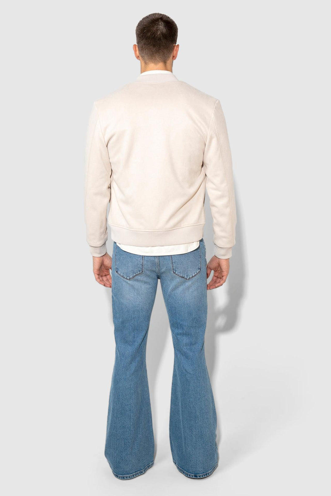 Detail view of MONFRÈRE Hendrix Calabasas men's blue stretch rigid denim five pocket super flare leg jean.