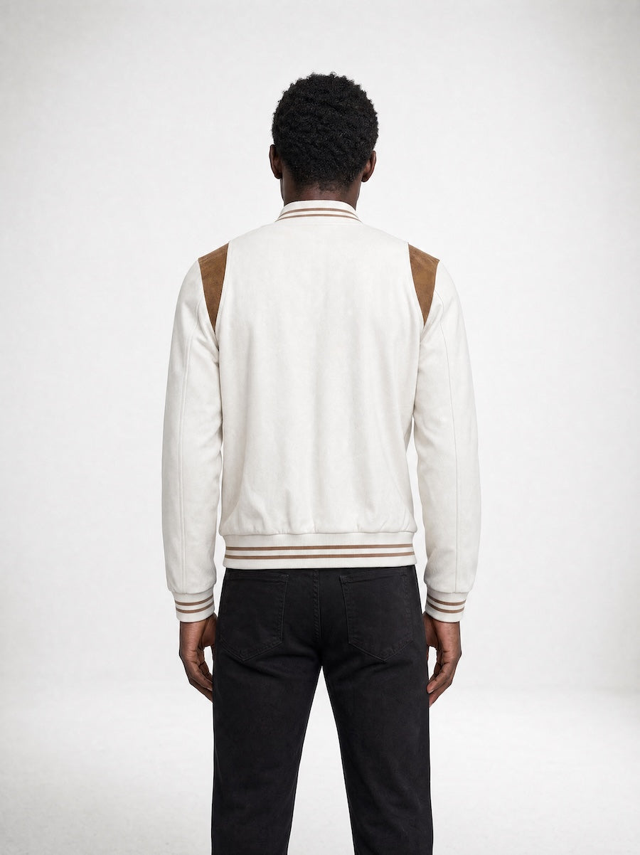 Back profile of MONFRÈRE Jeter Varsity Vintage Mocha men's off white ivory soft faux suede stretch fabric varsity jacket.
