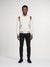 Model wearing monfrère jeter varsity vintage mocha men's off white ivory soft faux suede stretch fabric varsity jacket