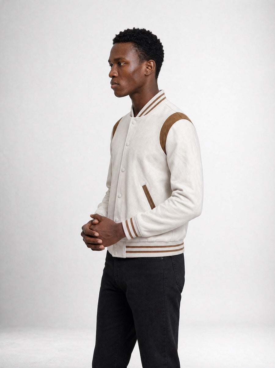 Side profile of MONFRÈRE Jeter Varsity Vintage Mocha men's off white ivory soft faux suede stretch fabric varsity jacket.