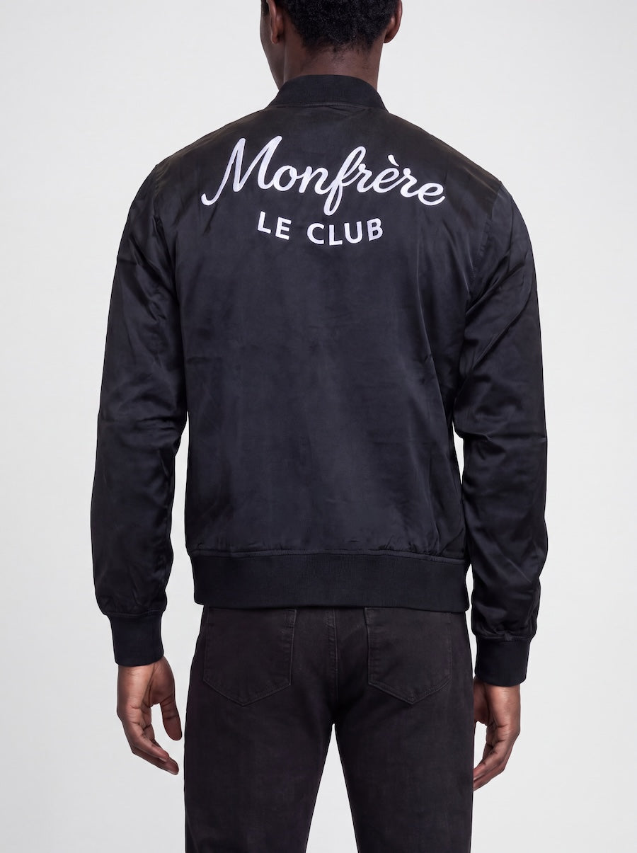 Back profile of MONFRÈRE Maverick Silk Noir Le Club men's black stretch viscose silk bomber jacket.