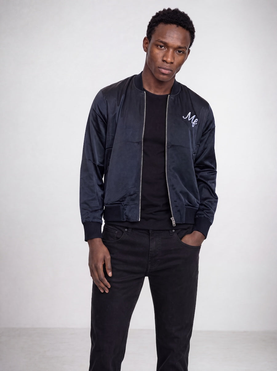 Front profile of MONFRÈRE Maverick Silk Noir Le Club men's black stretch viscose silk bomber jacket.