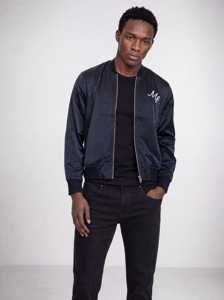 Front profile of MONFRÈRE Maverick Silk Noir Le Club men&