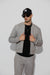 Front profile of MONFRÈRE Maverick Butter Suede Cool Grey men's light grey soft faux suede stretch fabric bomber jacket.