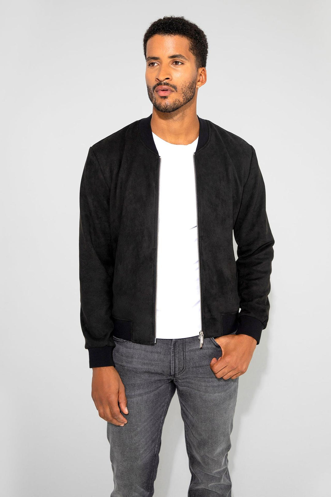 Front profile of MONFRÈRE Maverick Butter Suede Noir men's black soft faux suede stretch fabric bomber jacket.