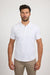 Front profile of MONFRÈRE Pierce Blanc men's white stretch jersey knit polo shirt.