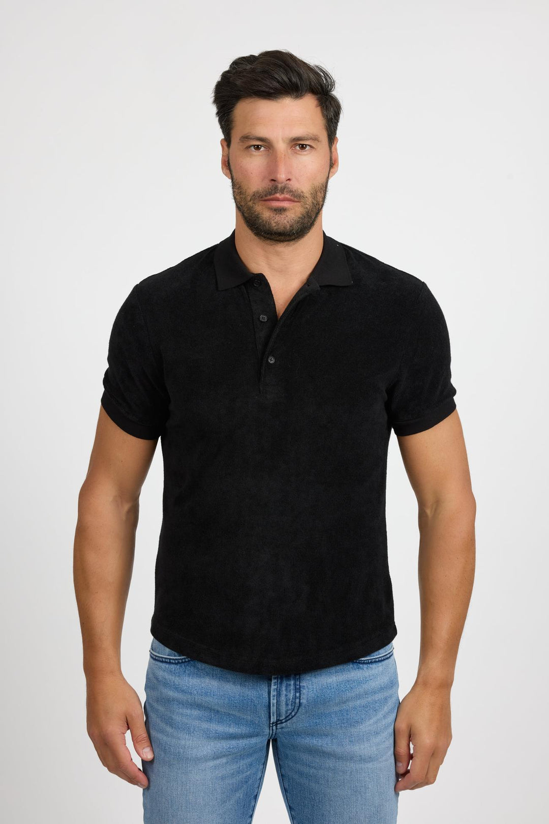 Front profile of MONFRÈRE Pierce Noir men's black stretch jersey knit polo shirt.