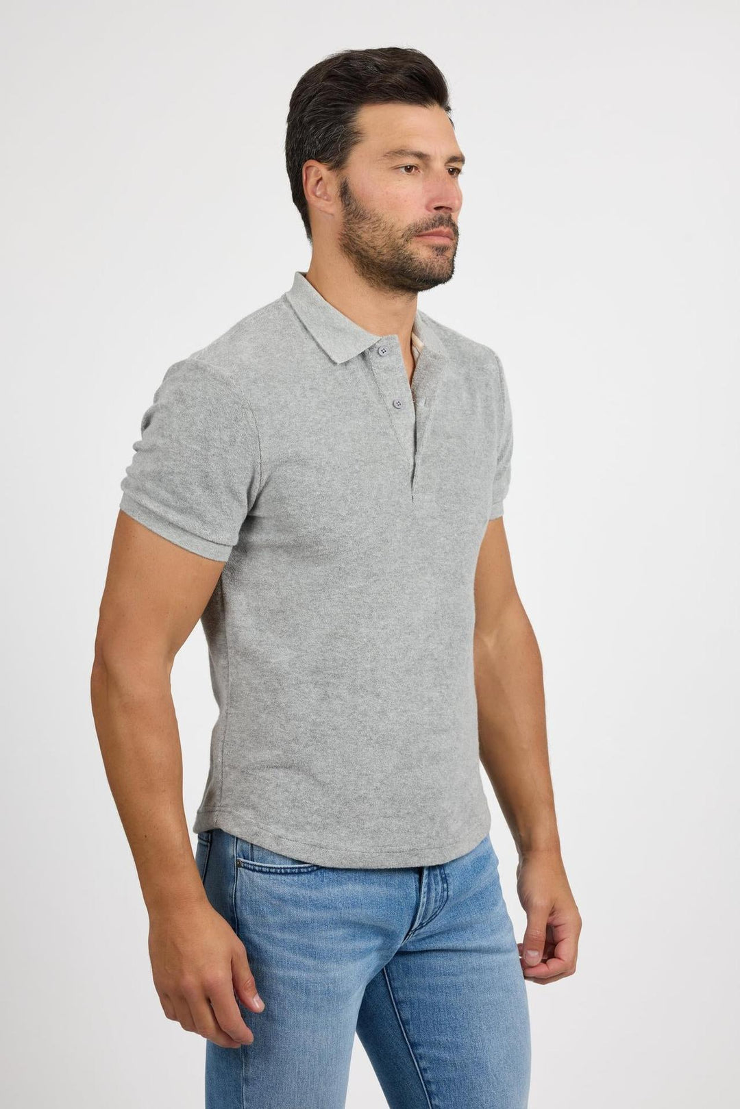 Side profile of MONFRÈRE Pierce Towel Terry Light Grey men's light grey stretch towel terry polo shirt.
