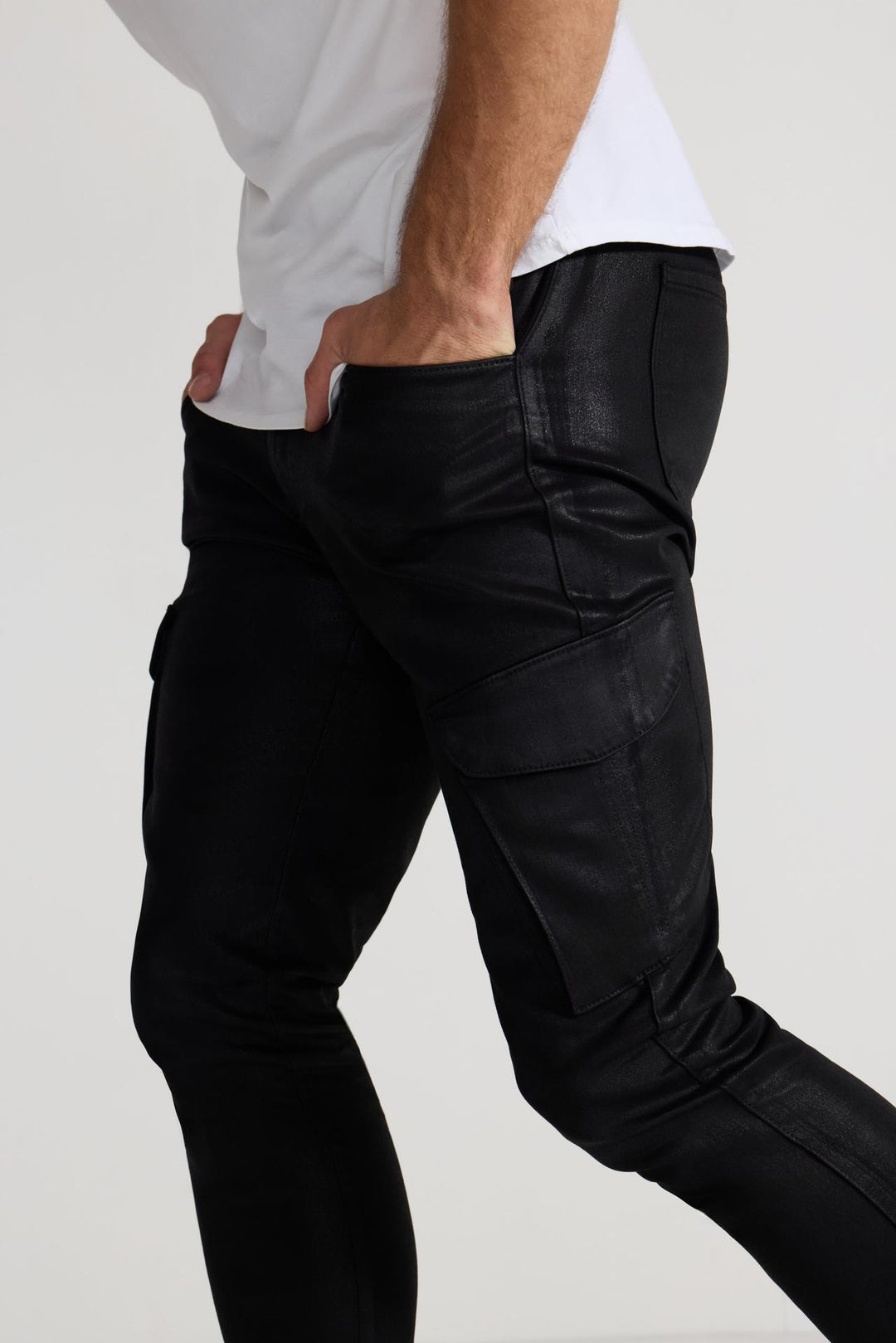 Close up of view MONFRÈRE Preston Coated Noir men's black coated stretch sateen tencel twill skinny cargo pants.