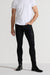 Front profile of MONFRÈRE Preston Coated Noir men's black coated stretch sateen tencel twill skinny cargo pants.