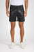 Front profile of MONFRÈRE West Coated Noir men's black stretch sateen tencel twill with a coated finish drawstring short.